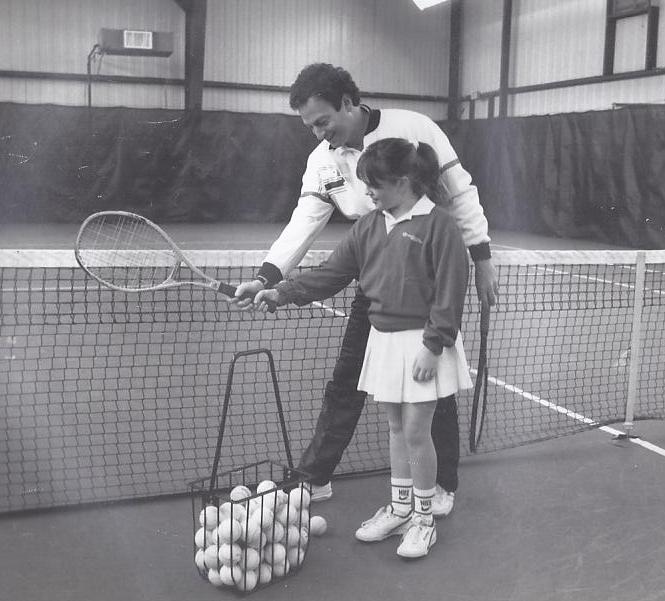 Jamie my daughter taking a session from "Pop',  1987 Woodbury Racquet Club
